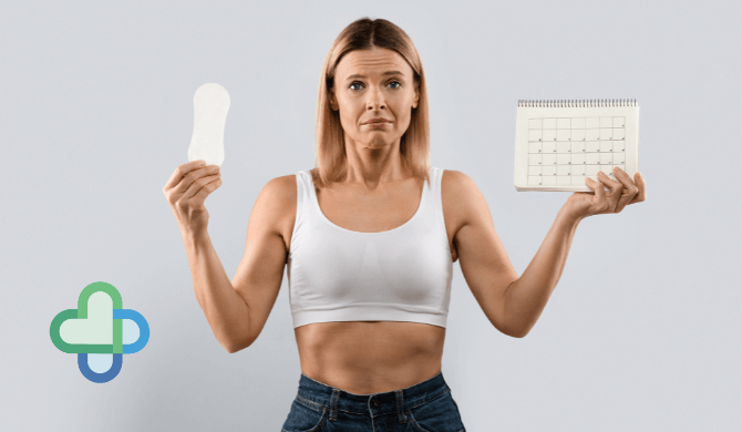woman holding pad and calendar - buy cheap period delay tablets - the family chemist