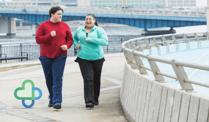 obese man walking with his girlfriend - buy cheap erectile dysfunction treatment - the family chemist