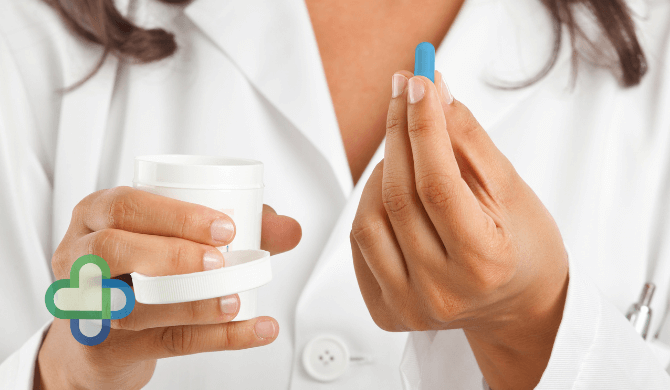 woman holding viagra in hand | Buy cheap Viagra online