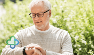 man with erectile dysfunction looking at his watch