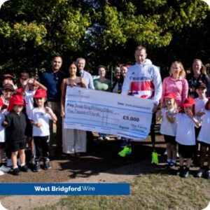 The Family Chemist directors with Richard Whitehead presenting fundraising cheque to school