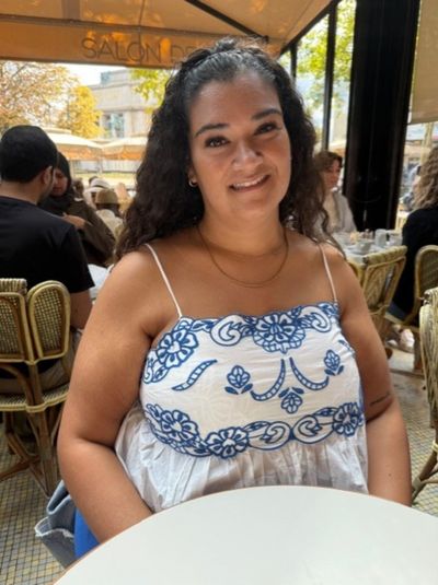 Mine Sherefali testimonial picture, a happy patient smiling